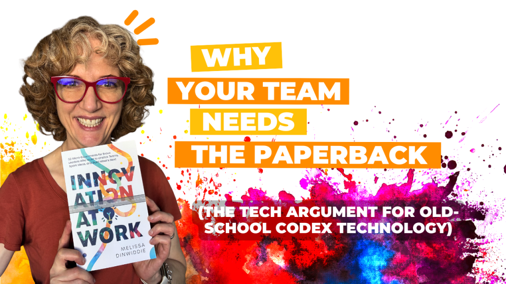 Melissa Dinwiddie, a curly-haired woman wearing red glasses and a rust-colored top, smiles broadly while holding up her book Innovation at Work: 52 Micro-Experiments for Brave Leaders Who Want to Unstick Teams, Spark Ideas, and Build What's Next. Bold orange and white text beside her reads "Why Your Team Needs the Paperback (The Tech Argument for Old-School Codex Technology)." The background features an abstract paint splatter in red, hot pink, deep blue, and golden yellow against white.